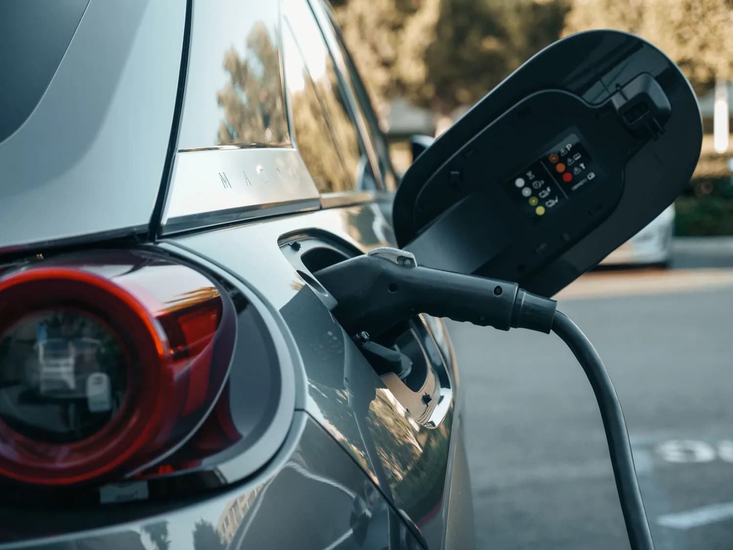 Electric vehicle being charged